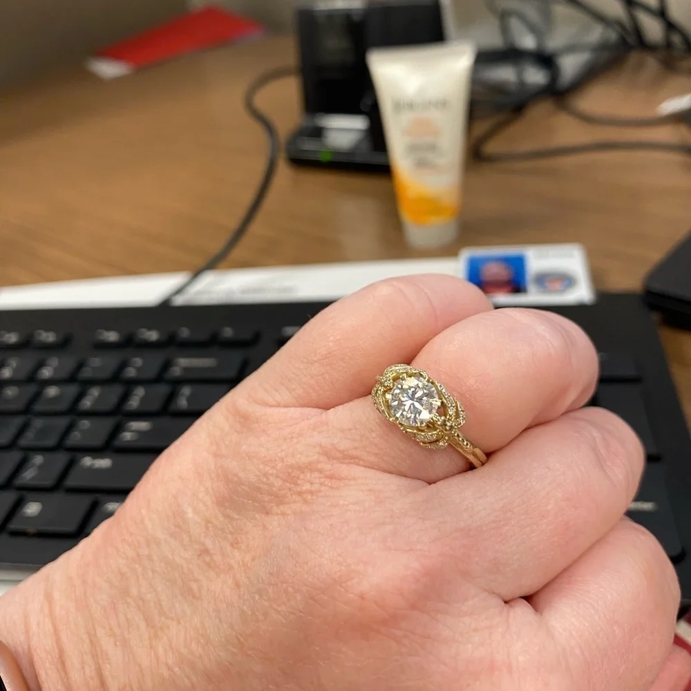 10kt yellow gold and moissanite dragonfly ring.